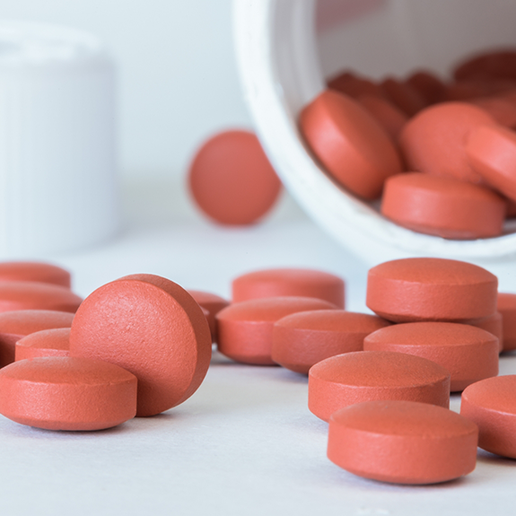 Close up of bottle and pills