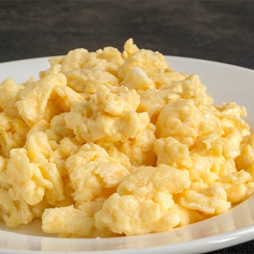 Close-up of scrambled eggs on a plate