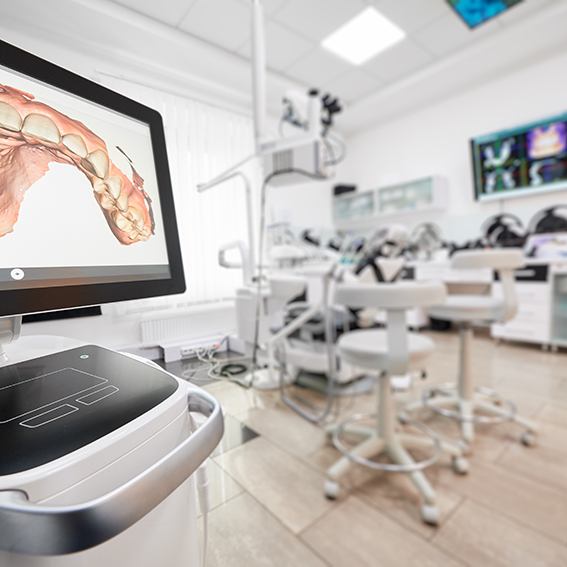 Tooth scan displayed on computer monitor in dental office