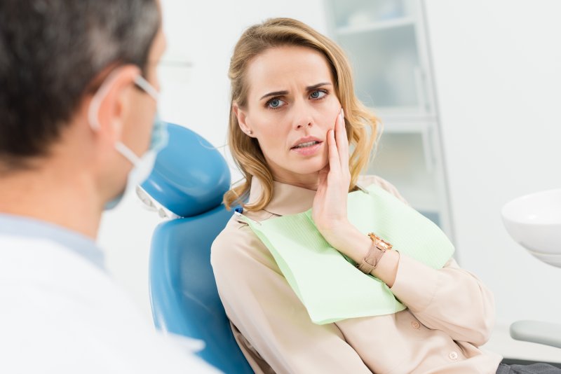 Female patient at dentist’s office looking concerned